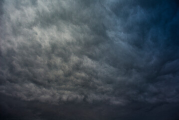 Stormy rain clouds background. Dark sky