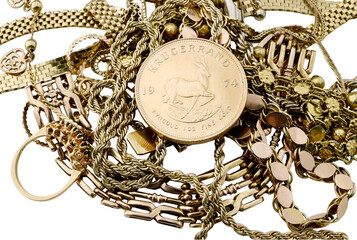 Pile of old gold scrap  jewelry and krugerrand coin isolated on transparency  photo png file