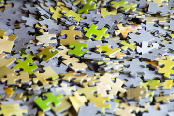 many puzzle pieces. selective focus
