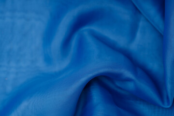 blue silk. wavy background fabric