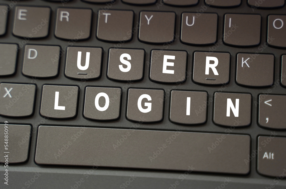 Poster on the black keyboard, the inscription is highlighted in white - user login