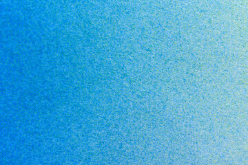 macro photography blue and yellow spray paint on white paper