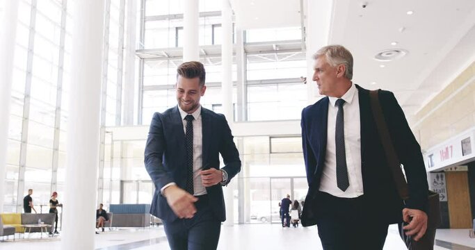 Businessmen, welcome handshake and walking in office, thank you and greeting in morning, smile and happy. Corporate worker, shaking hands and partnership with trust, b2b and work deal in the morning