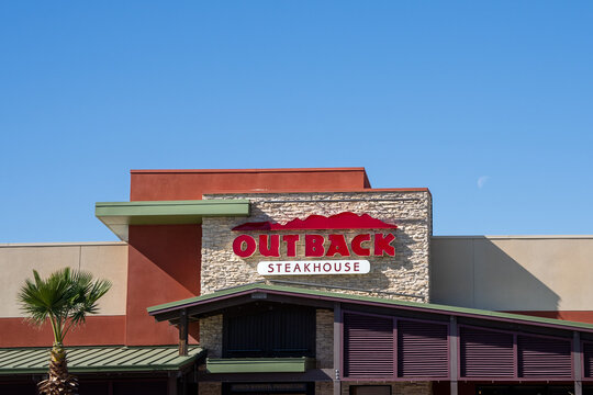 Phoenix, AZ - Nov. 15, 2022: Outback Steakhouse chain restaurant in Village Crossroads at E. Cactus Rd. & N. Tatum Blvd