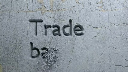 Animation of Trade barriers words carved in stone wall