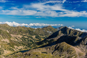 High mountain landscape with beautiful blue sky and lakes on the valley.