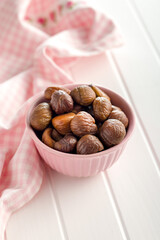 Peeled chestnuts. Sweet roasted chestnuts in bowl.