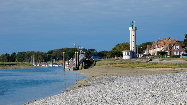 Lighthouse of Cayeux sur Mer at the Pointe du Hourdel with its pebble beach. Cayeux sur Mer is a resort town in the Somme department in Hauts-de-France in northern France