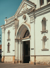 Fototapeta na wymiar facade of the church san sebastian in cuenca- Euador on a sunny day