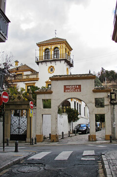 Main gate to "Huerta de los ángeles" in Granada, during a cloudy day.