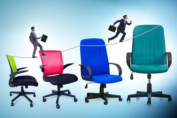 Promotion concept with businessman and chairs