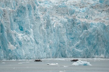 Boats against glaciers in Inside Passage, Alaska