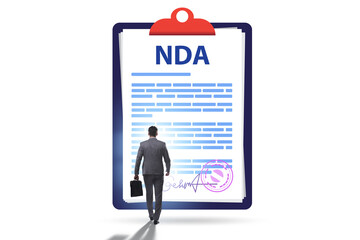 Businessman in non-disclosure agreement concept