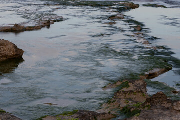 Long exposure of sea and rocks. Waves and the rock creating a beautiful picture