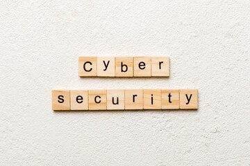 Cyber Security word written on wood block. Cyber Security text on cement table for your desing, concept