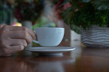 Hot coffee in a smoky cup for drinking