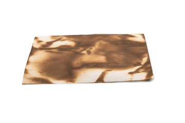 Burnt paper isolated on a white background.