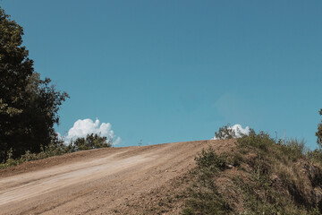 Low angle view of a motocross track. Copy space. Concept of motocross, extreme sports.