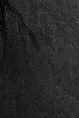 Dark grey black slate background or texture.