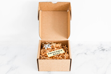 promotions and shopping over the festive season, parcel or gift box with Awesome Deal label