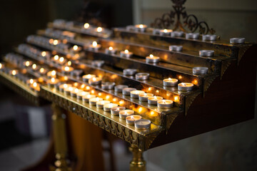 many candles in the church