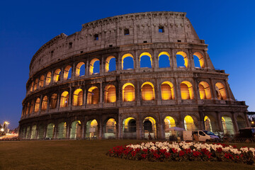 Naklejka na ściany i meble rome, italy, colosseum old ancient building gladiator battle at night.