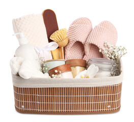 Spa gift set in wicker basket on table against white background