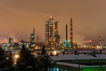 Plakat oil refinery at night