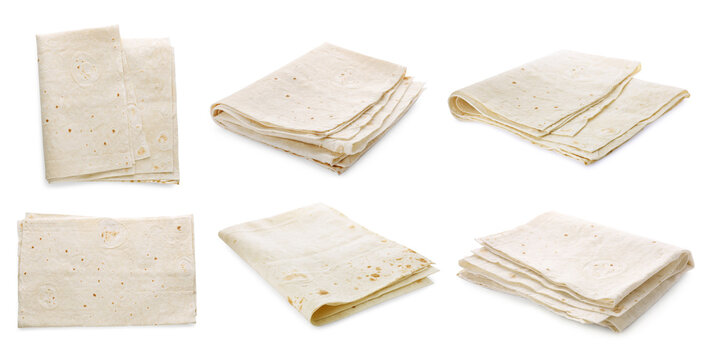 Set with tasty Armenian lavash on white background