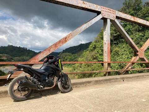 Motorcycle on bridge
