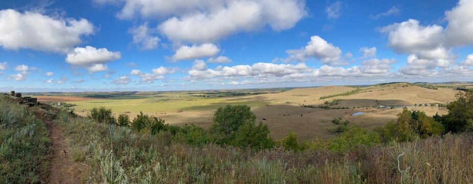 Rural landscape with partly cloudy sky