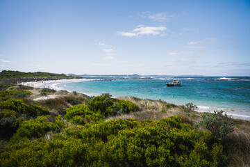 People enjoying the Dog Beach at Peaceful Bay, west of Denmark. This spectacular coastline overlooks William Bay National Park.