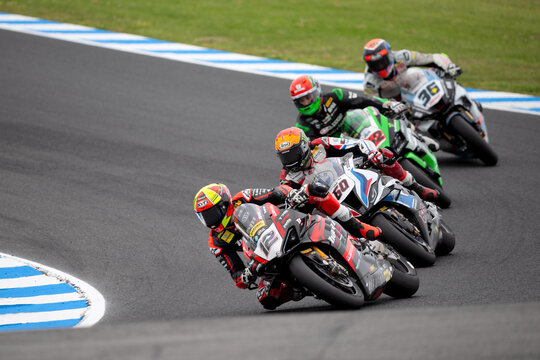 PHILLIP ISLAND, AUSTRALIA - NOVEMBER 19: Xavi Fores of Spain on the BARNI Spark Racing Team Ducati leads the pack during The 2022 FIM World Superbike Championship at Phillip Island, Australia.