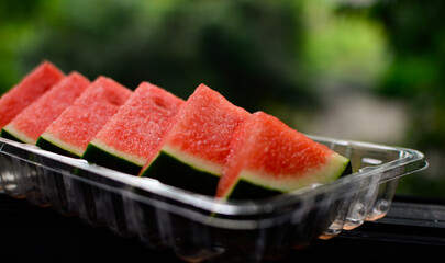 Watermelon is a ripe red fruit that is delicious.