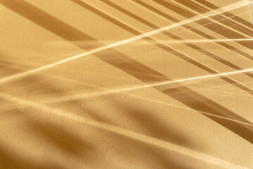 Abstract beige-brown background with refraction of light from prism. Mockup for presentations,...