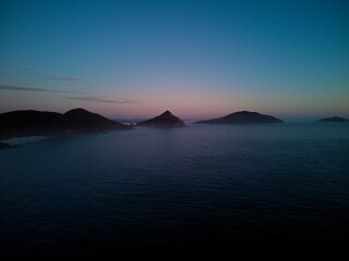 Fototapeta premium Drone photo from Fingal Beach to Tomaree Mountain in Port Stephens, just prior to sunrise.