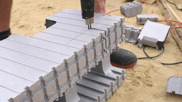 Cutting ICF block with heat-gun.