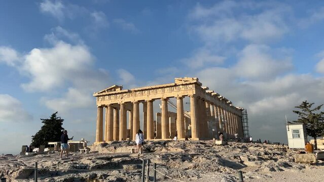 Timelapse of the Partenon of Athens in a splendid autumn moorning with some clouds