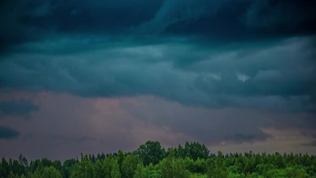 Timelapse of clouds forming before the storm. Colorful and vibrant storm establishing shot.