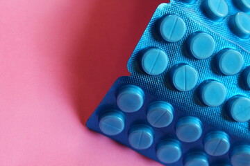Paracetamol tablets package on a plain background used for fever