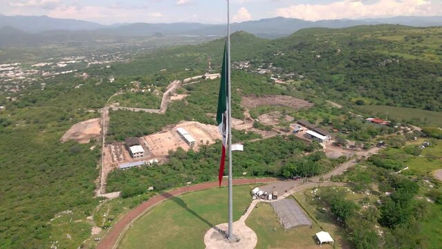 Iguala, Guerrero, Mexico. Mexican Flag waving high over Mexico