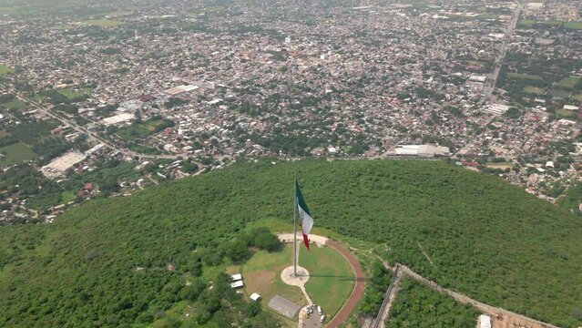 Flying towards a Mexican flag Iguala, Guerrero, Mexico