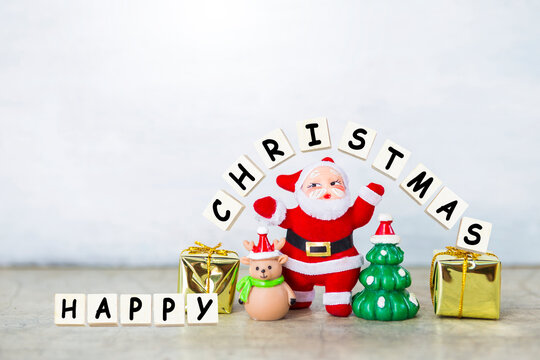 Happy Christmas sign with Santa clause and Christmas decoration on white background, festive season background concept