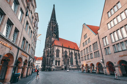 26 July 2022, Munster, Germany: Lamberti church belfry tower at Prinzipal market square
