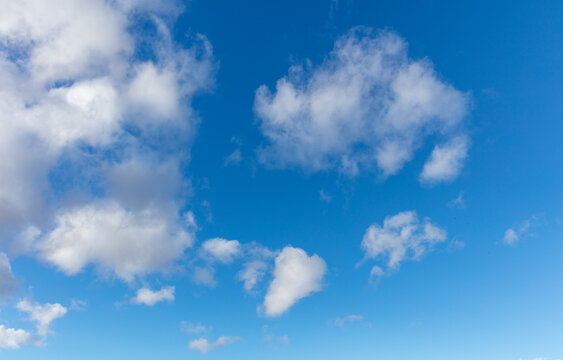 clear blue sky and clouds background