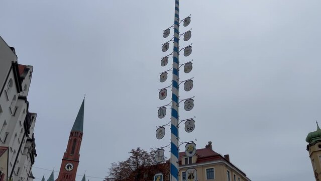 Big tower with trade emblems at Wiener platz in Munich city, Germany