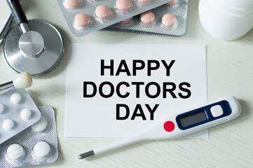 Happy Doctors Day wording with stethoscope. Medical concept