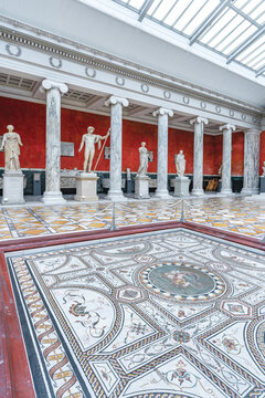 Copenhagen, Denmark. Circa September 2022. Interior hall of the Ny Carlsberg Glyptotek with statues and columns. Roman and greek marble sculptures