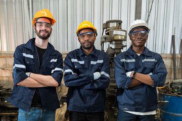 Portrait of group of male ethnic diverse engineer worker wear safety uniform, glasses and helmet...