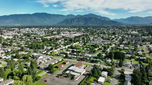 Panorama Of Suburbans Near Chilliwack Municipal Airport With Fraser Valley At Background In BC, Canada. Aerial Shot